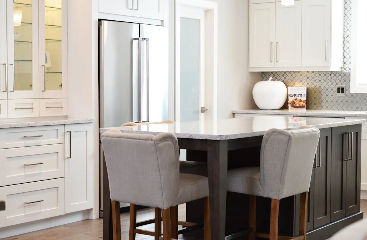 kitchen with dining island, two chairs